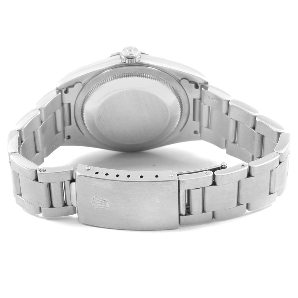 The image shows the back view of a Rolex Datejust 16234 Men
s Stainless Steel Silver Dial 16234 Men
s Stainless Steel Silver Dial watch, focusing on the case back and the closed bracelet clasp.