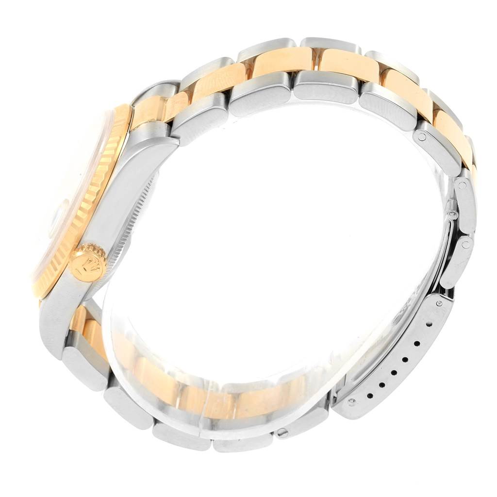 The image shows a side view of a Rolex Datejust 16233 Men's Steel and Gold (two tone) White Dial 16233 Men's Steel and Gold (two tone) White Dial watch, highlighting the case, bezel, crown, and bracelet.