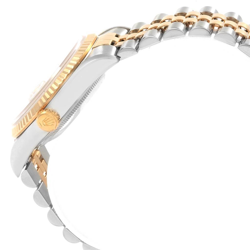 The image shows a side view of a Rolex Datejust 16233 Men's Steel and Gold (two tone) Champagne Dial 16233 Men's Steel and Gold (two tone) Champagne Dial watch, highlighting the crown, bezel, and bracelet.