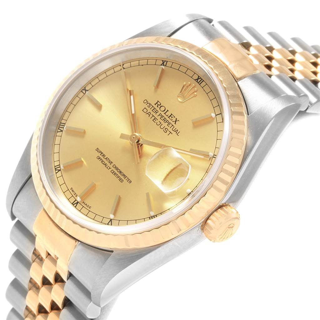 The image shows a side angle of a Rolex Datejust 16233 Men's Steel and Gold (two tone) Champagne Dial 16233 Men's Steel and Gold (two tone) Champagne Dial watch, displaying the dial, bezel, crown, and part of the bracelet.