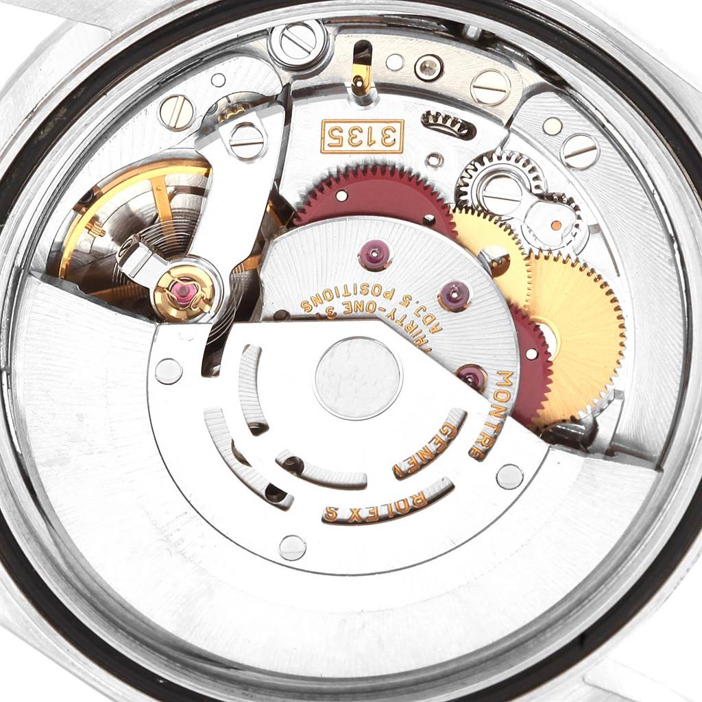 This image shows the internal movement mechanism of a Rolex Datejust 16220 Men
s Stainless Steel Black Dial 16220 Men
s Stainless Steel Black Dial watch from a top-down angle.