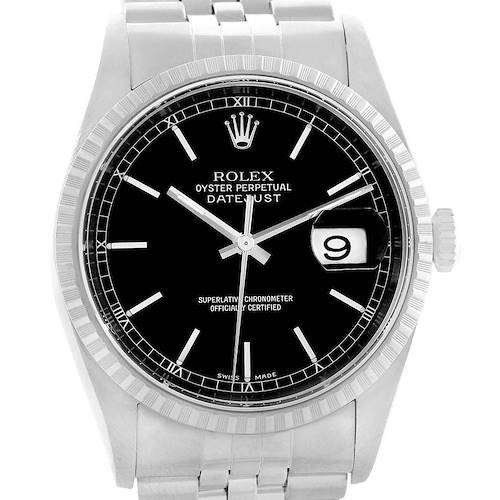 The image shows a frontal view of a Rolex Datejust watch, emphasizing its black dial, fluted bezel, and date window.