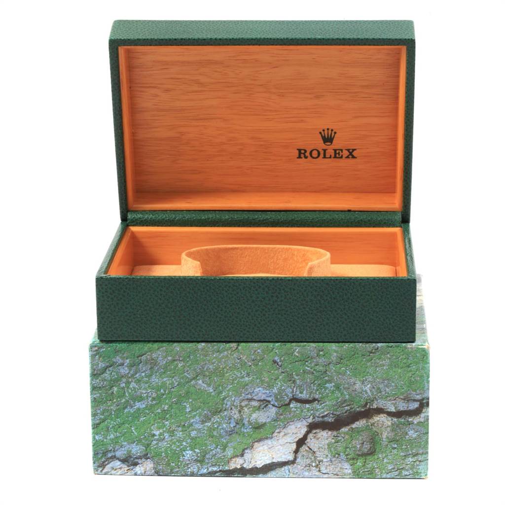 This image shows an open Rolex Datejust 16233 Men
s Steel and Gold (two tone) Champagne Dial 16233 Men
s Steel and Gold (two tone) Champagne Dial watch box, highlighting the interior and watch holder.