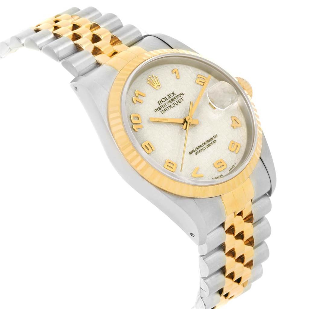 The image shows a Rolex Datejust 16233 Men
s Steel and Gold (two tone) Beige Dial 16233 Men
s Steel and Gold (two tone) Beige Dial watch from a side angle, highlighting the dial, bezel, crown, and two-tone bracelet.