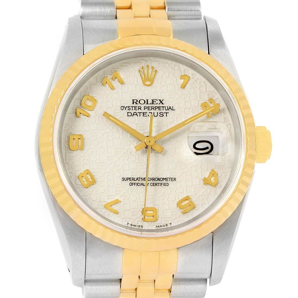The image shows a front view of the Rolex Datejust 16233 Men
s Steel and Gold (two tone) Beige Dial 16233 Men
s Steel and Gold (two tone) Beige Dial watch, highlighting its face, bezel, and part of the bracelet.