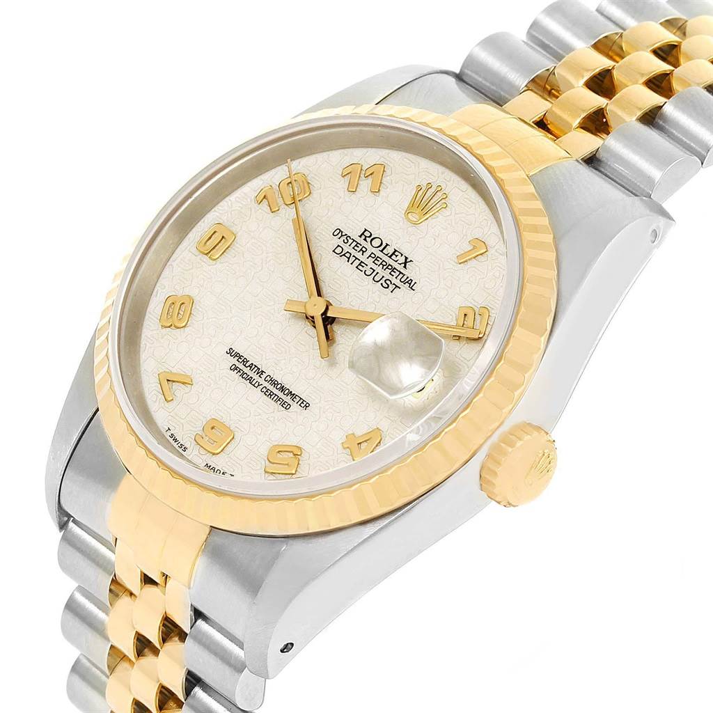 The image shows a close-up angled view of the Rolex Datejust 16233 Men
s Steel and Gold (two tone) Beige Dial 16233 Men
s Steel and Gold (two tone) Beige Dial watch, highlighting its face, crown, and partial two-tone bracelet.