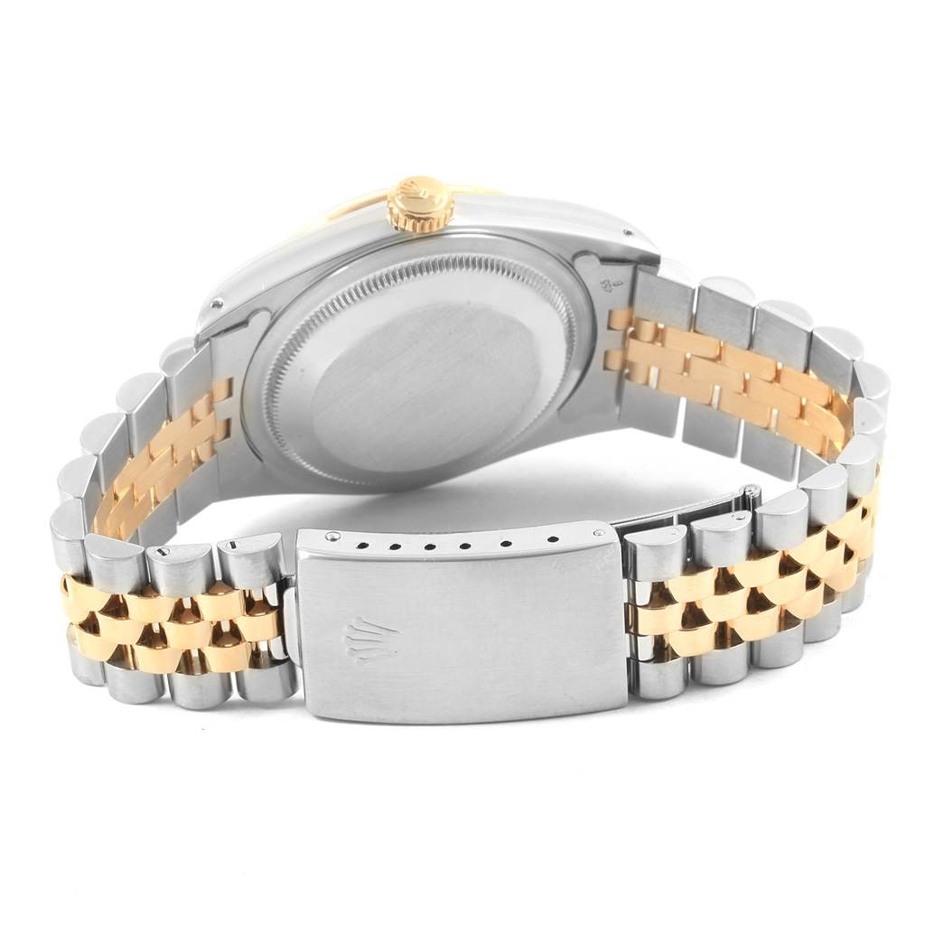 The image shows the back case and bracelet of a Rolex Datejust 16233 Men
s Steel and Gold (two tone) Beige Dial 16233 Men
s Steel and Gold (two tone) Beige Dial watch at a rear angle, highlighting the two-tone Jubilee bracelet.