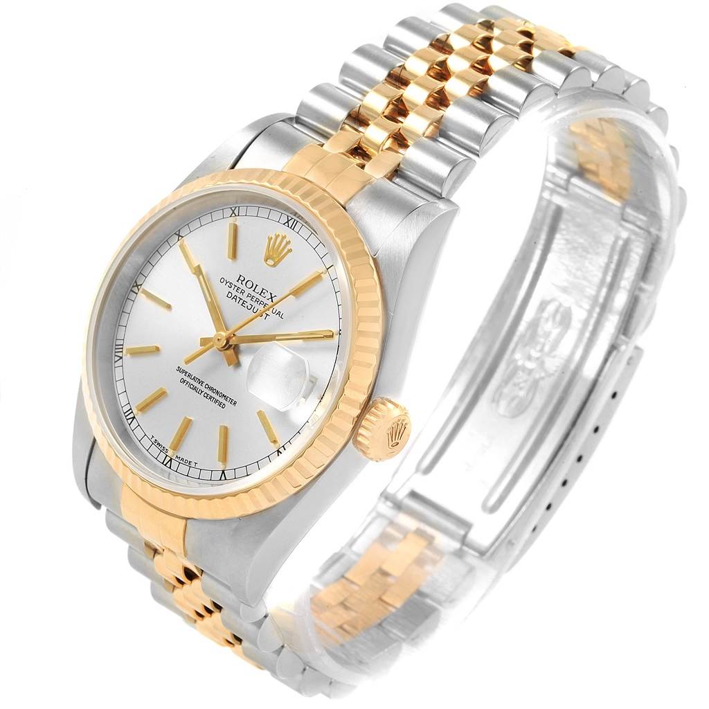 The Rolex Datejust 16233 Men's Steel and Gold (two tone) Silver Dial 16233 Men's Steel and Gold (two tone) Silver Dial watch is shown at an angled view, displaying the dial, bezel, crown, and bracelet.