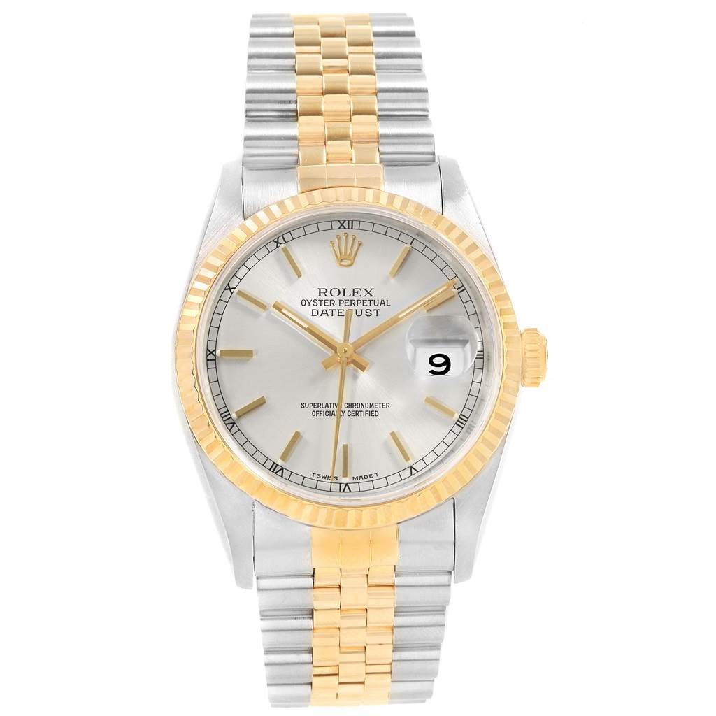 This Rolex Datejust 16233 Men's Steel and Gold (two tone) Silver Dial 16233 Men's Steel and Gold (two tone) Silver Dial watch is shown from a front angle, displaying its face, bezel, and bracelet.