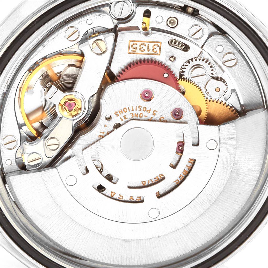 This image shows a close-up view of the inner mechanical movement of a Rolex Datejust 16220 Men's Stainless Steel Grey Dial 16220 Men's Stainless Steel Grey Dial watch.