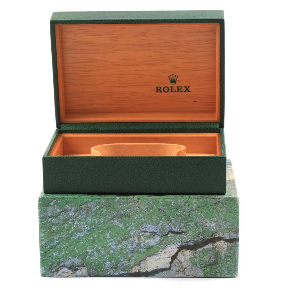 This image shows an open Rolex Datejust 16220 Men's Stainless Steel Grey Dial 16220 Men's Stainless Steel Grey Dial watch box from a front angle, revealing the interior cushion and branding.