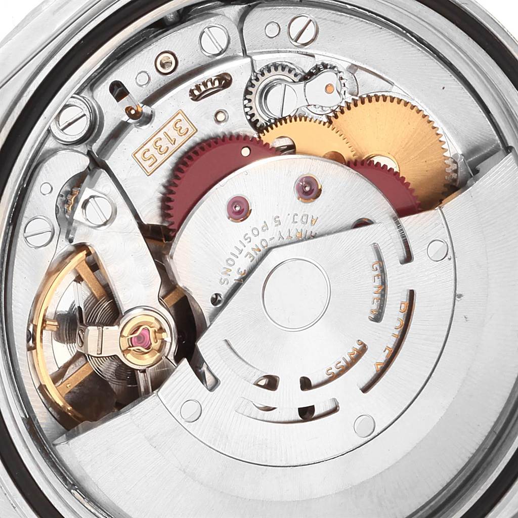The image shows the inner mechanical movement of a Rolex Datejust 16220 Men
s Stainless Steel Black Dial 16220 Men
s Stainless Steel Black Dial watch from a close-up angle.
