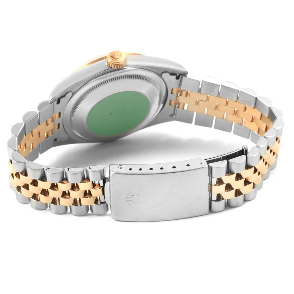 This image of a Rolex Datejust 16233 Men's Steel and Gold (two tone) Champagne Dial 16233 Men's Steel and Gold (two tone) Champagne Dial watch shows the back case and jubilee bracelet from a rear angle.