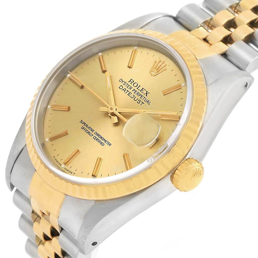 The image shows a close-up, angled view of the Rolex Datejust 16233 Men
s Steel and Gold (two tone) Champagne Dial 16233 Men
s Steel and Gold (two tone) Champagne Dial watch, highlighting the dial, bezel, crown, and part of the bracelet.