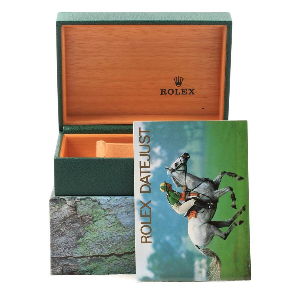 The image shows an open Rolex Datejust 16233 Men
s Steel and Gold (two tone) Champagne Dial 16233 Men
s Steel and Gold (two tone) Champagne Dial watch box and its booklet.