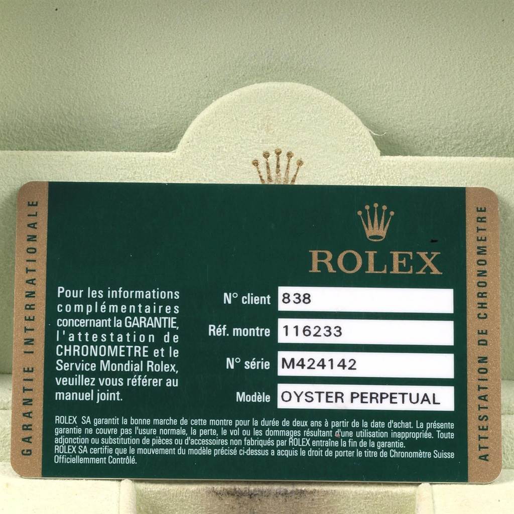 This image shows a Rolex Datejust 116233 Men's Stainless Steel Silver Dial 116233 Men's Stainless Steel Silver Dial model warranty card placed horizontally.
