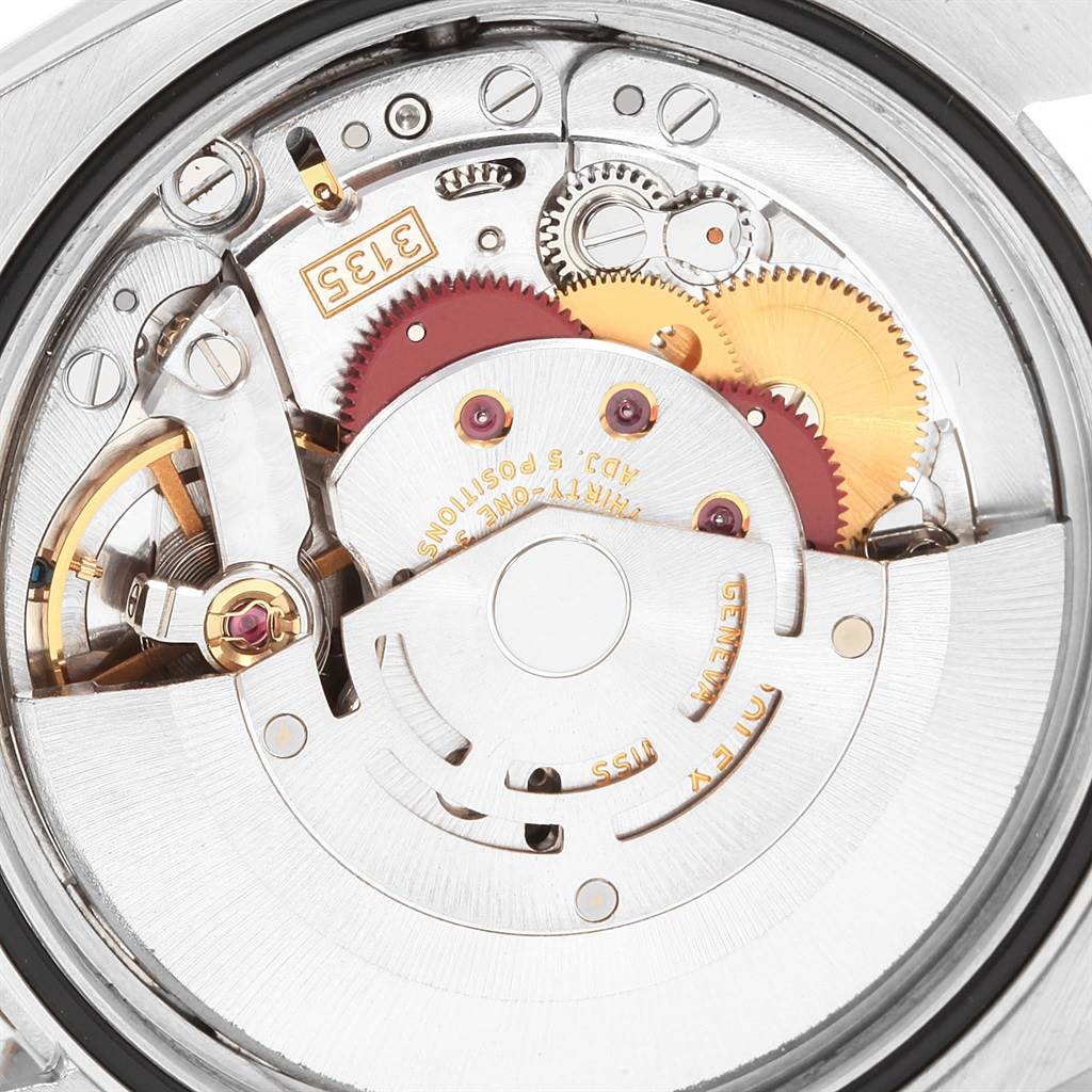 The image shows a detailed view of the movement and internal mechanics of the Rolex Datejust 116233 Men's Stainless Steel Silver Dial 116233 Men's Stainless Steel Silver Dial watch.