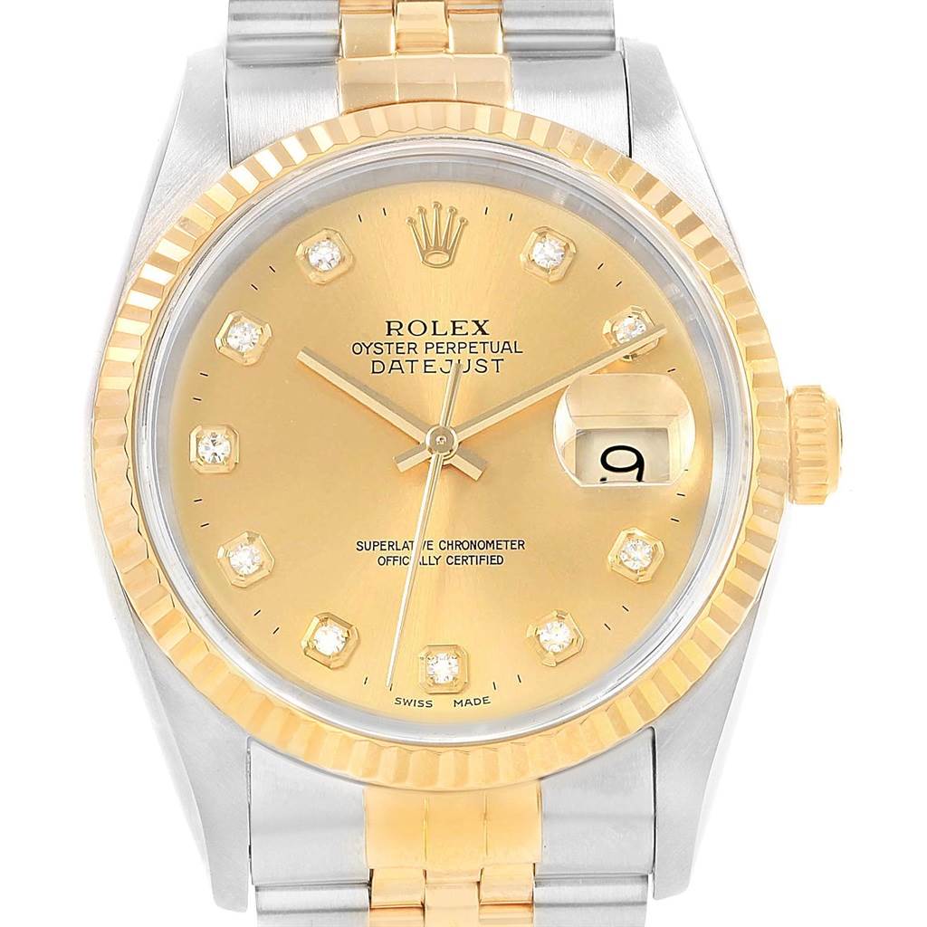 This is a front view of the Rolex Datejust 16233 Men's Steel and Gold (two tone) Champagne Dial 16233 Men's Steel and Gold (two tone) Champagne Dial watch showing the dial, hands, date window, fluted bezel, and two-tone bracelet.