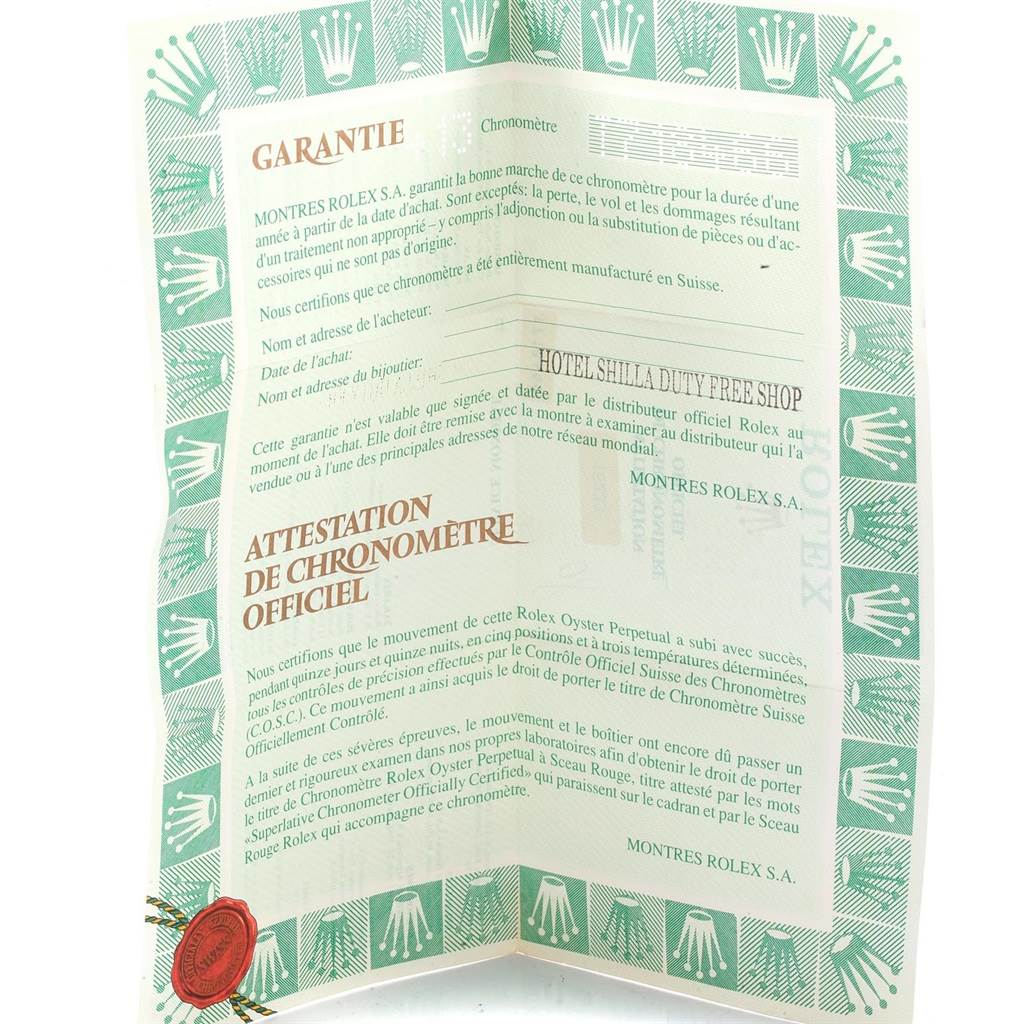 This image shows the warranty and official chronometer certification papers for a Rolex Datejust 16233 Men's Steel and Gold (two tone) Champagne Dial 16233 Men's Steel and Gold (two tone) Champagne Dial model.