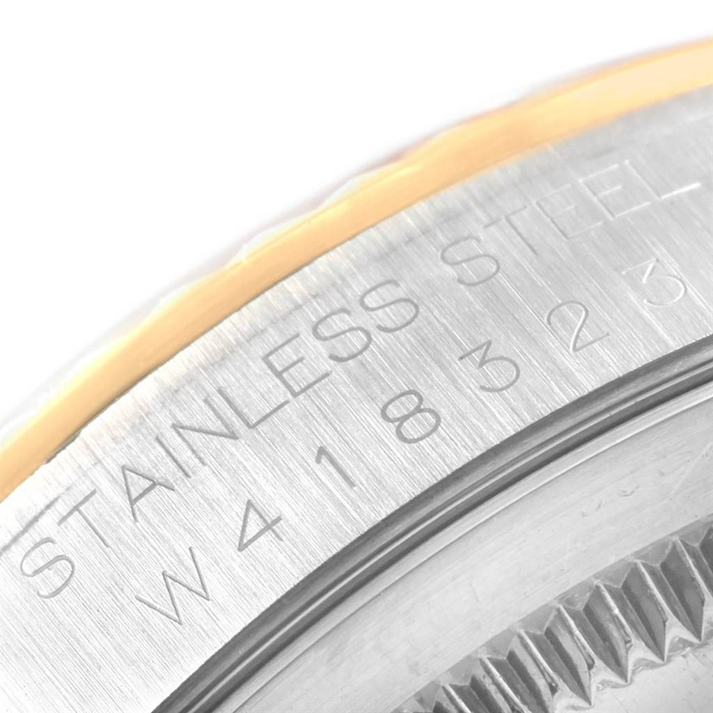 This image shows a close-up of the case back of a Rolex Datejust 16233 Men's Steel and Gold (two tone) Champagne Dial 16233 Men's Steel and Gold (two tone) Champagne Dial model, highlighting the stainless steel marking.