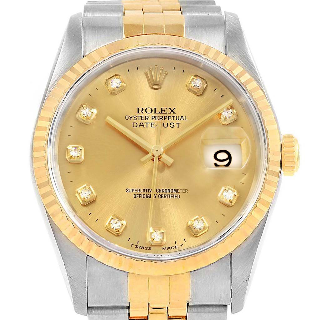 This image shows a front view of a Rolex Datejust 16233 Men's Steel and Gold (two tone) Champagne Dial 16233 Men's Steel and Gold (two tone) Champagne Dial watch, highlighting its gold dial, diamond markers, and two-tone bracelet.