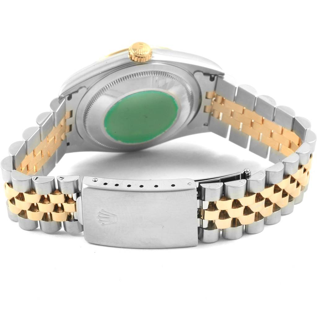 This image shows a rear view of the Rolex Datejust 16233 Men's Steel and Gold (two tone) Champagne Dial 16233 Men's Steel and Gold (two tone) Champagne Dial watch, highlighting the case back, crown, and two-tone bracelet with clasp.