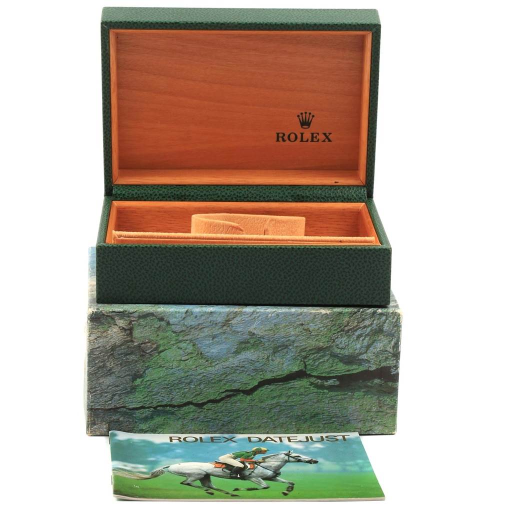 The image shows a Rolex Datejust 16233 Men's Steel and Gold (two tone) Champagne Dial 16233 Men's Steel and Gold (two tone) Champagne Dial watch box, both its outer and inner sections, and an accompanying booklet from a front angle.