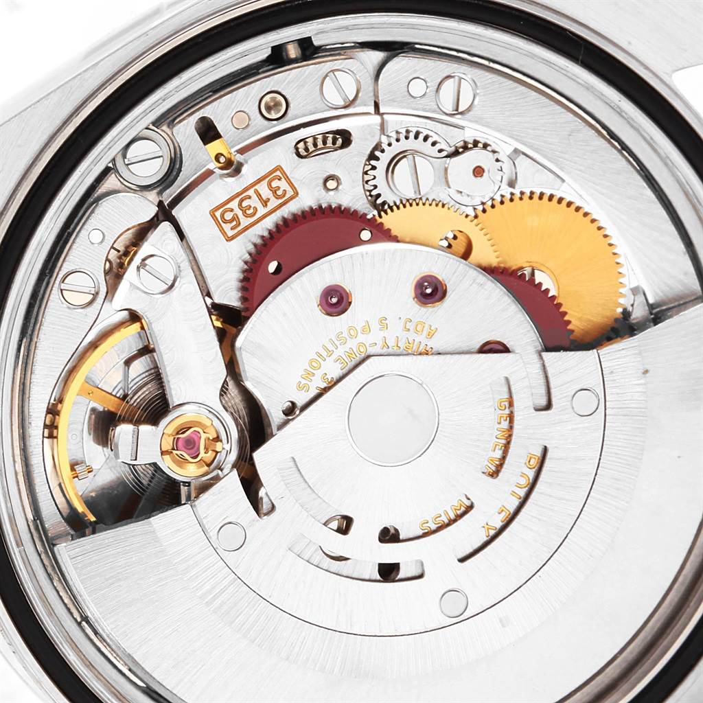 The image shows a close-up of the internal movement mechanism of a Rolex Datejust 16233 Men's Steel and Gold (two tone) Champagne Dial 16233 Men's Steel and Gold (two tone) Champagne Dial.