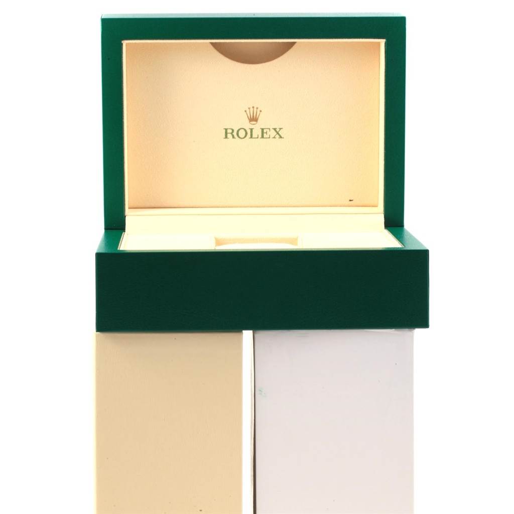 The image shows an open Rolex Datejust 116234 Men's Stainless Steel Black Dial 116234 Men's Stainless Steel Black Dial watch box from a frontal angle, displaying its interior.