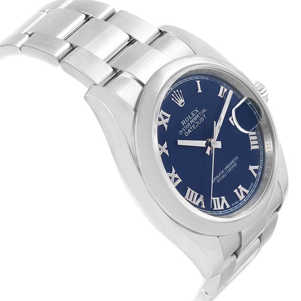 This Rolex Datejust 116200 Men's Stainless Steel Blue Dial 116200 Men's Stainless Steel Blue Dial watch is shown from a side angle, highlighting its stainless steel bracelet and blue dial with Roman numeral markers.