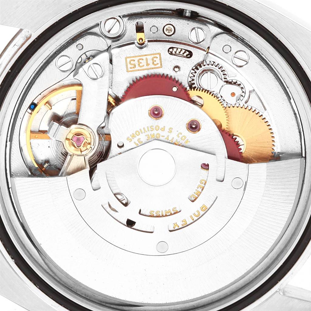 This image shows the internal mechanical movement of a Rolex Datejust 116200 Men's Stainless Steel Blue Dial 116200 Men's Stainless Steel Blue Dial watch.