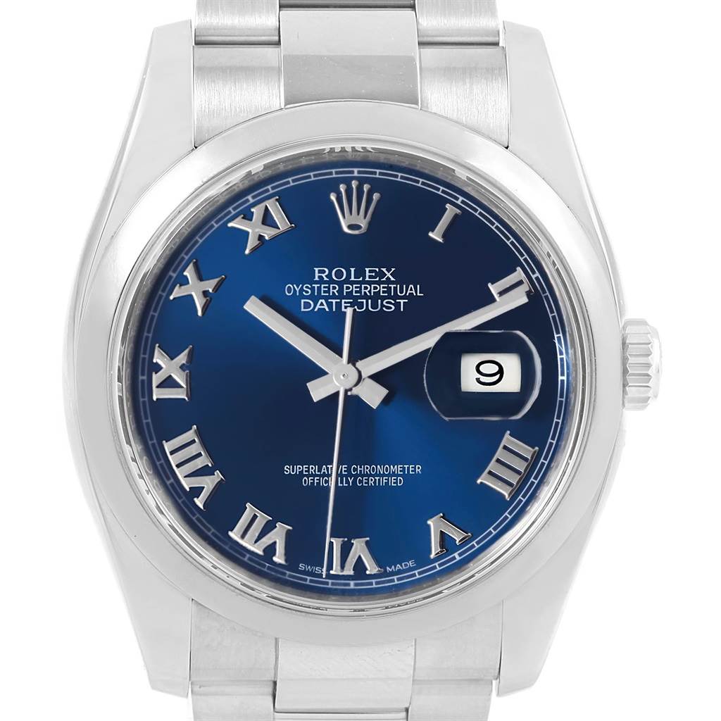The image shows a frontal view of a Rolex Datejust 116200 Men's Stainless Steel Blue Dial 116200 Men's Stainless Steel Blue Dial watch featuring a blue dial, Roman numerals, and a date display with a magnifier.