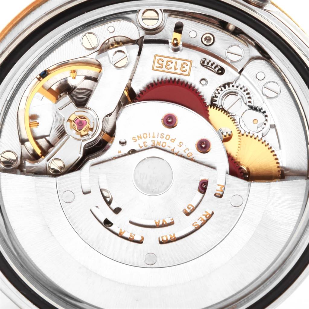 This is a close-up view of the internal mechanism of a Rolex Datejust 16233 Men's Steel and Gold (two tone) Black Dial 16233 Men's Steel and Gold (two tone) Black Dial model, showcasing the movement components.