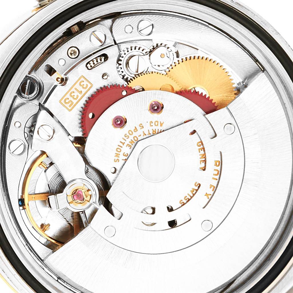 The image shows the inner mechanical movement of a Rolex Datejust 116203 Men's Stainless Steel Black Dial 116203 Men's Stainless Steel Black Dial watch from a top, close-up angle.