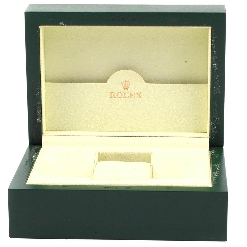 The image shows an open Rolex watch box for the Datejust model, displaying the interior compartments.
