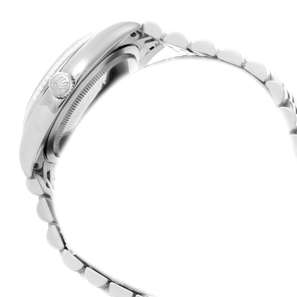 This image shows a side view of the Rolex Datejust 392T2233 Men
s Stainless Steel White Dial 392T2233 Men
s Stainless Steel White Dial watch, highlighting its case, crown, and part of the bracelet.