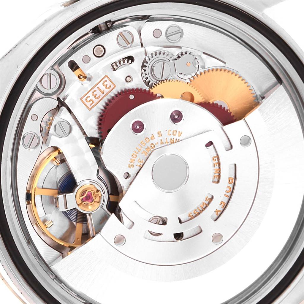 This image shows the internal mechanical movement of a Rolex Datejust 392T2233 Men
s Stainless Steel White Dial 392T2233 Men
s Stainless Steel White Dial watch from a close-up angle.