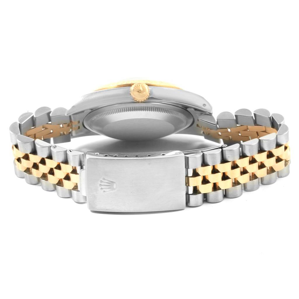 The image shows the back and side profile of a Rolex Datejust 16233 Men's Steel and Gold (two tone) Black Dial 16233 Men's Steel and Gold (two tone) Black Dial watch, highlighting the bracelet and clasp.