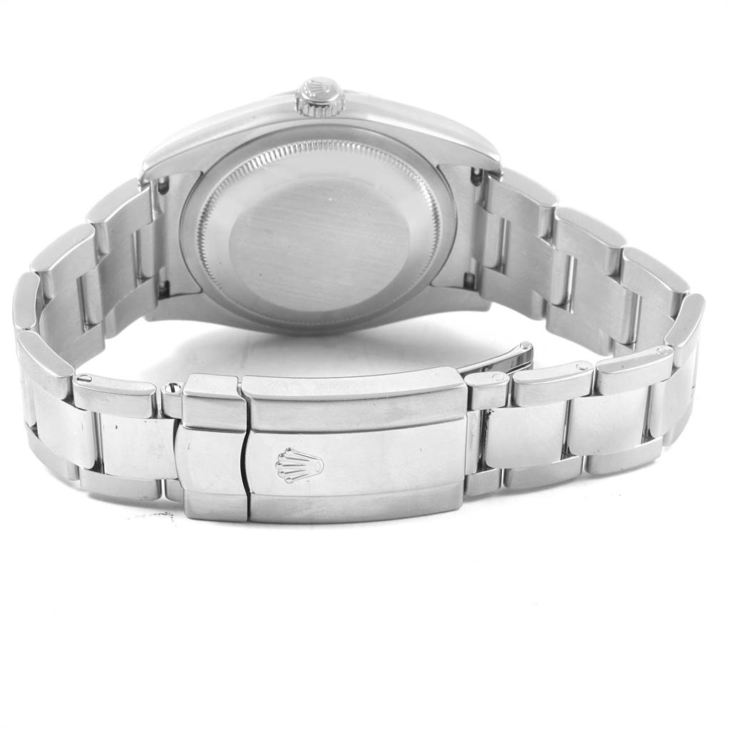 The image shows the back view of a Rolex Datejust 116200 Men's Stainless Steel Black Dial 116200 Men's Stainless Steel Black Dial watch, highlighting the case back and bracelet clasp with the Rolex logo.