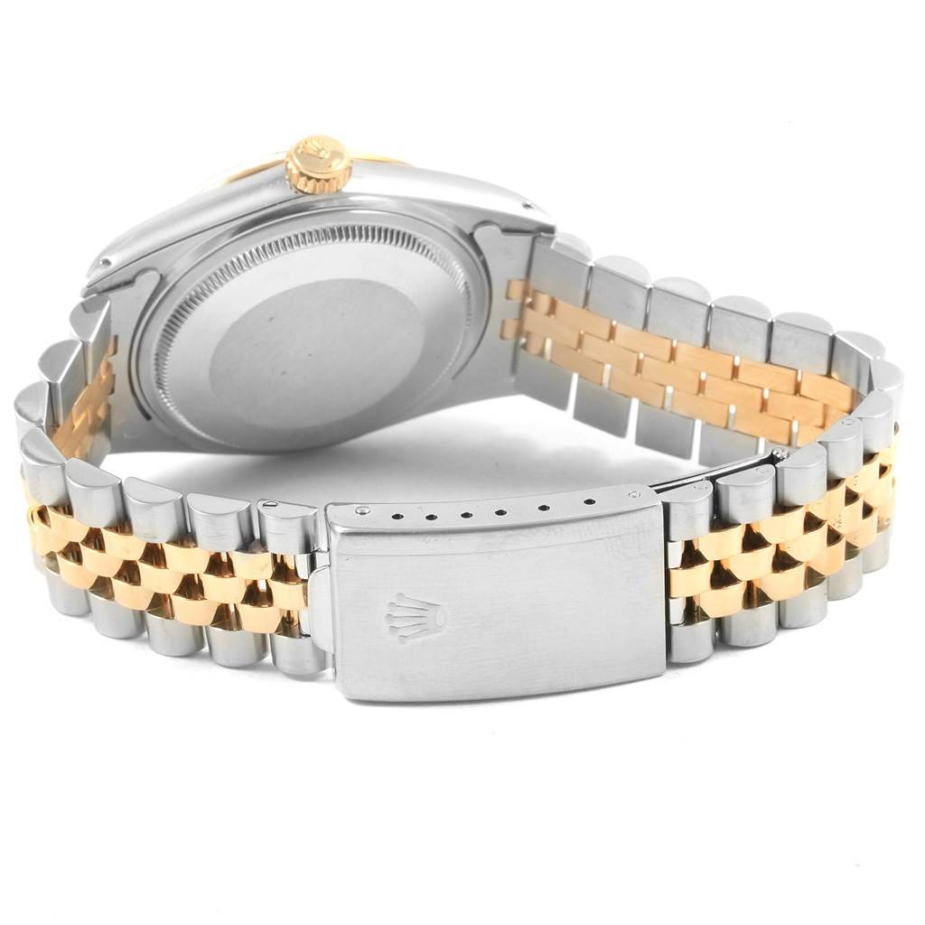 The image shows the back and bracelet clasp of a Rolex Datejust 16013 Men
s Stainless Steel Champagne Dial 16013 Men
s Stainless Steel Champagne Dial watch, highlighting its two-tone Jubilee bracelet.