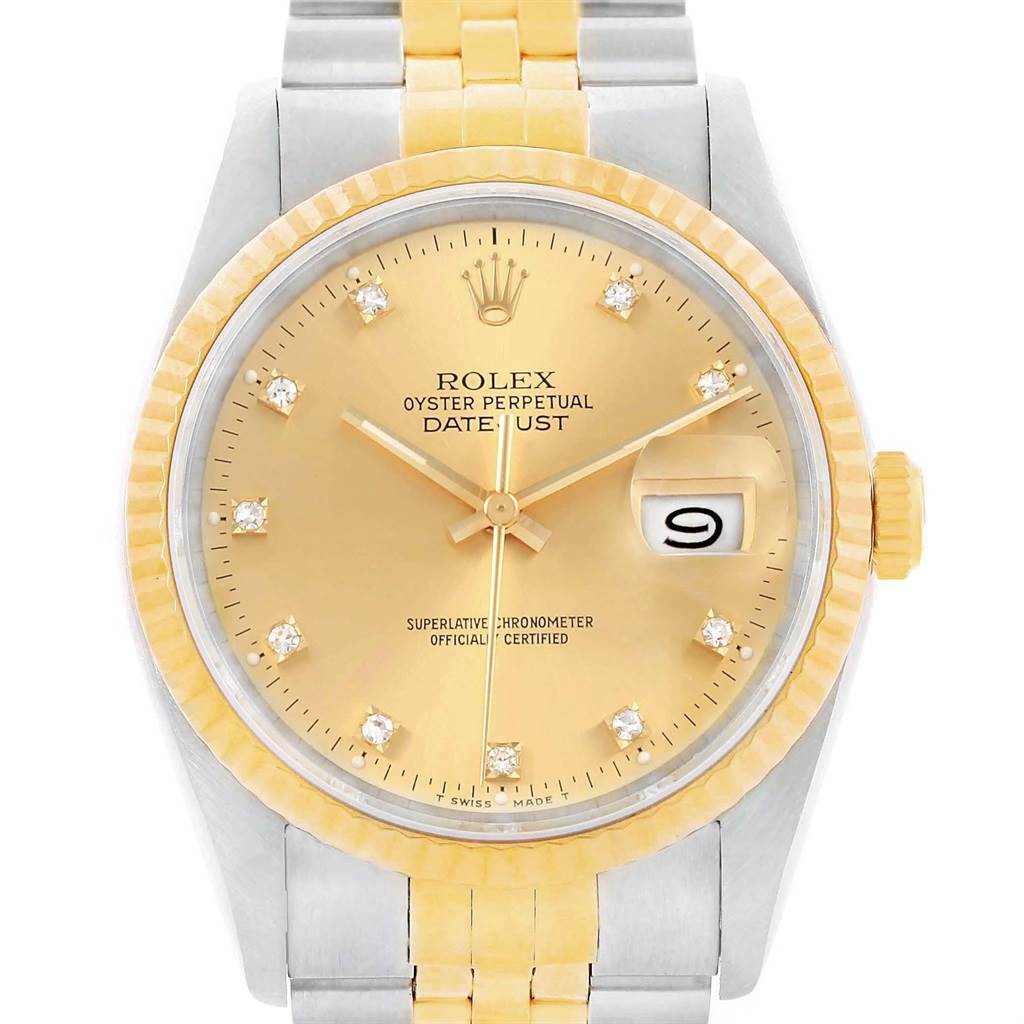 This image shows a frontal view of a Rolex Datejust 16013 Men
s Stainless Steel Champagne Dial 16013 Men
s Stainless Steel Champagne Dial watch, highlighting its gold dial, diamond hour markers, and date window.