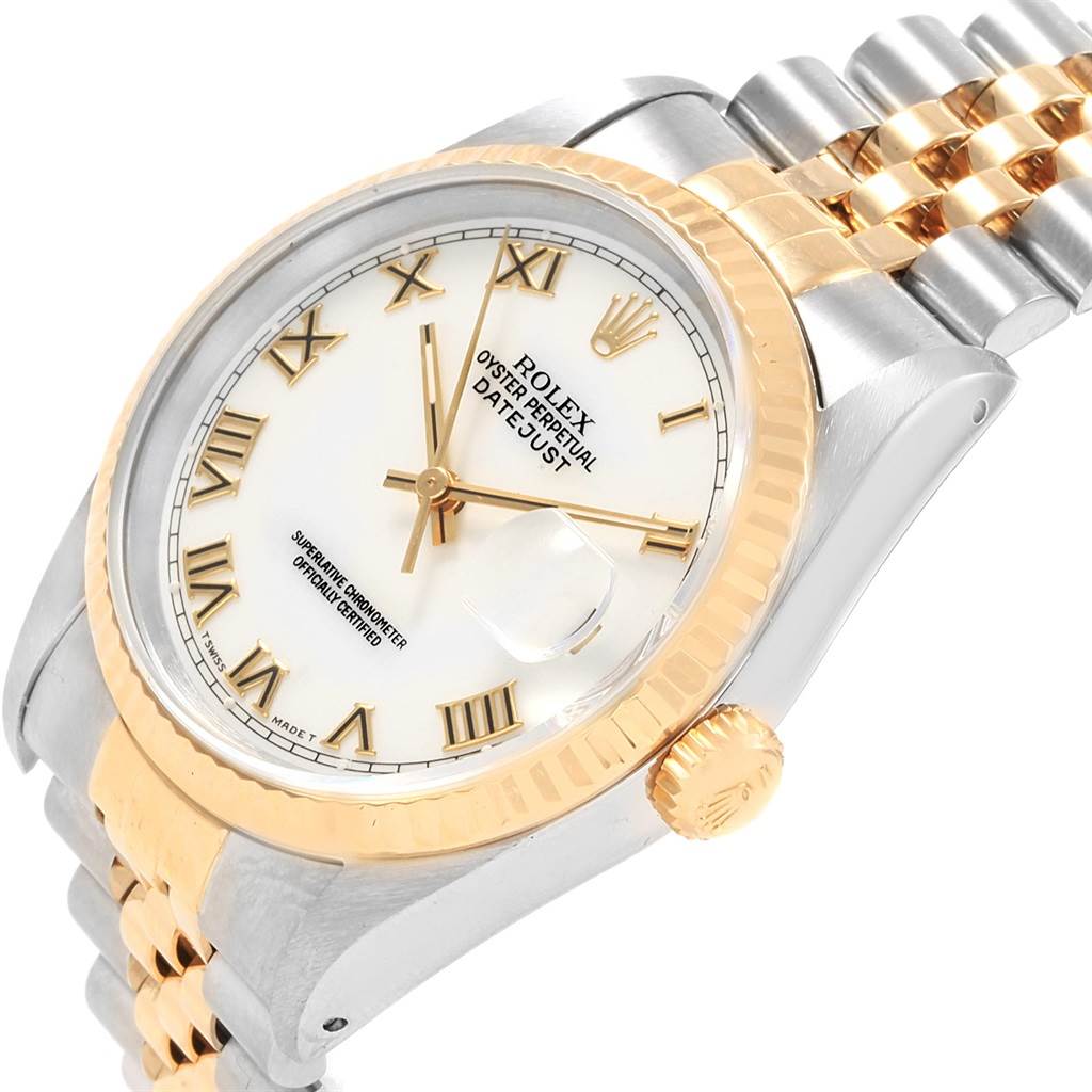 This image shows a partial close-up of a Rolex Datejust 16233 Men's Steel and Gold (two tone) White Dial 16233 Men's Steel and Gold (two tone) White Dial watch, featuring its dial, jubilee bracelet, bezel, crown, and part of the case.