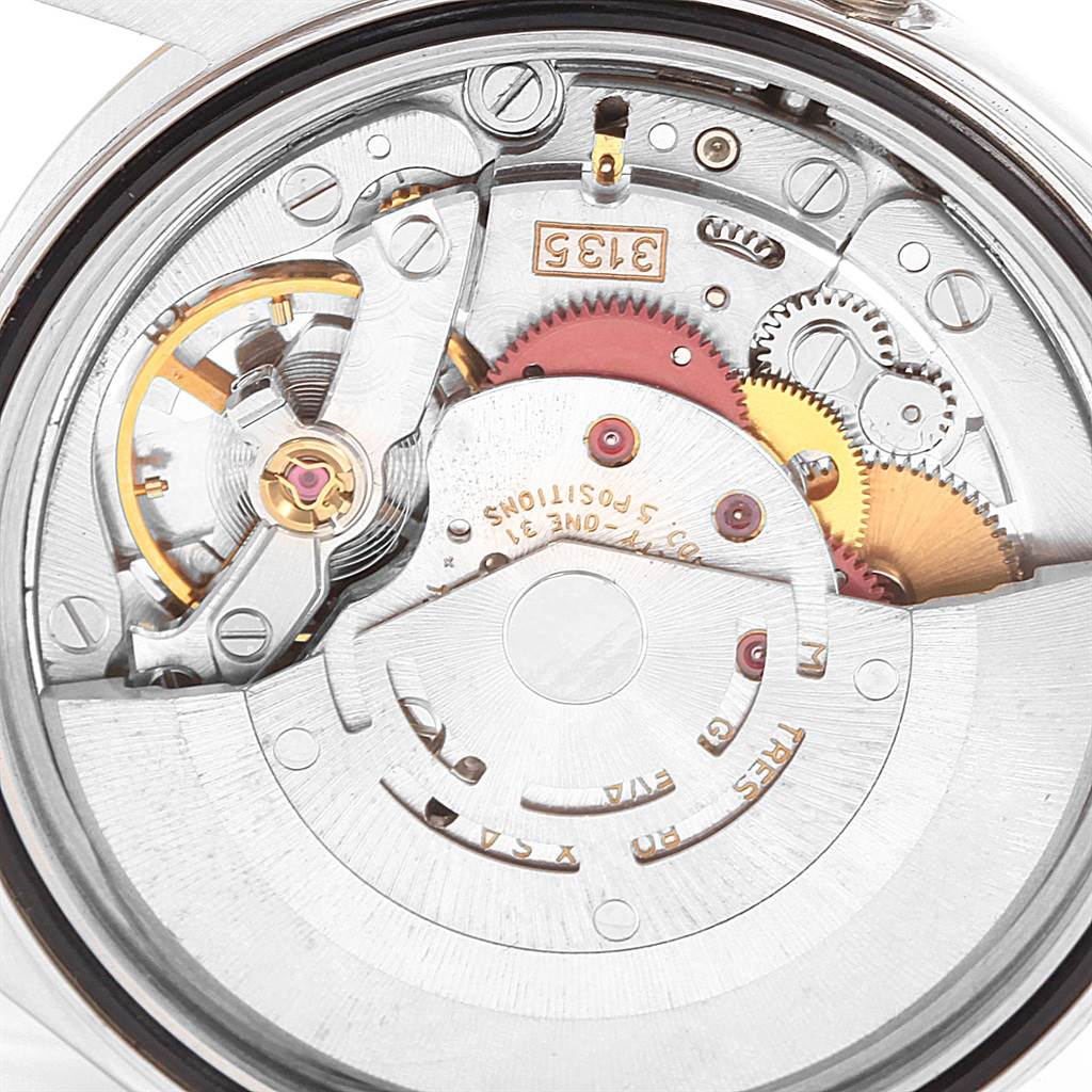 This image shows the movement mechanism of a Rolex Datejust 16233 Men's Steel and Gold (two tone) White Dial 16233 Men's Steel and Gold (two tone) White Dial, viewed from the back.