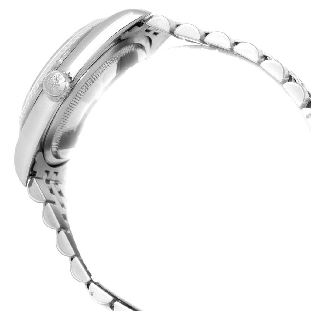 The image shows a side view of the Rolex Datejust 16234 Men
s Stainless Steel Silver Dial 16234 Men
s Stainless Steel Silver Dial watch, highlighting the watch case, crown, and part of the bracelet.