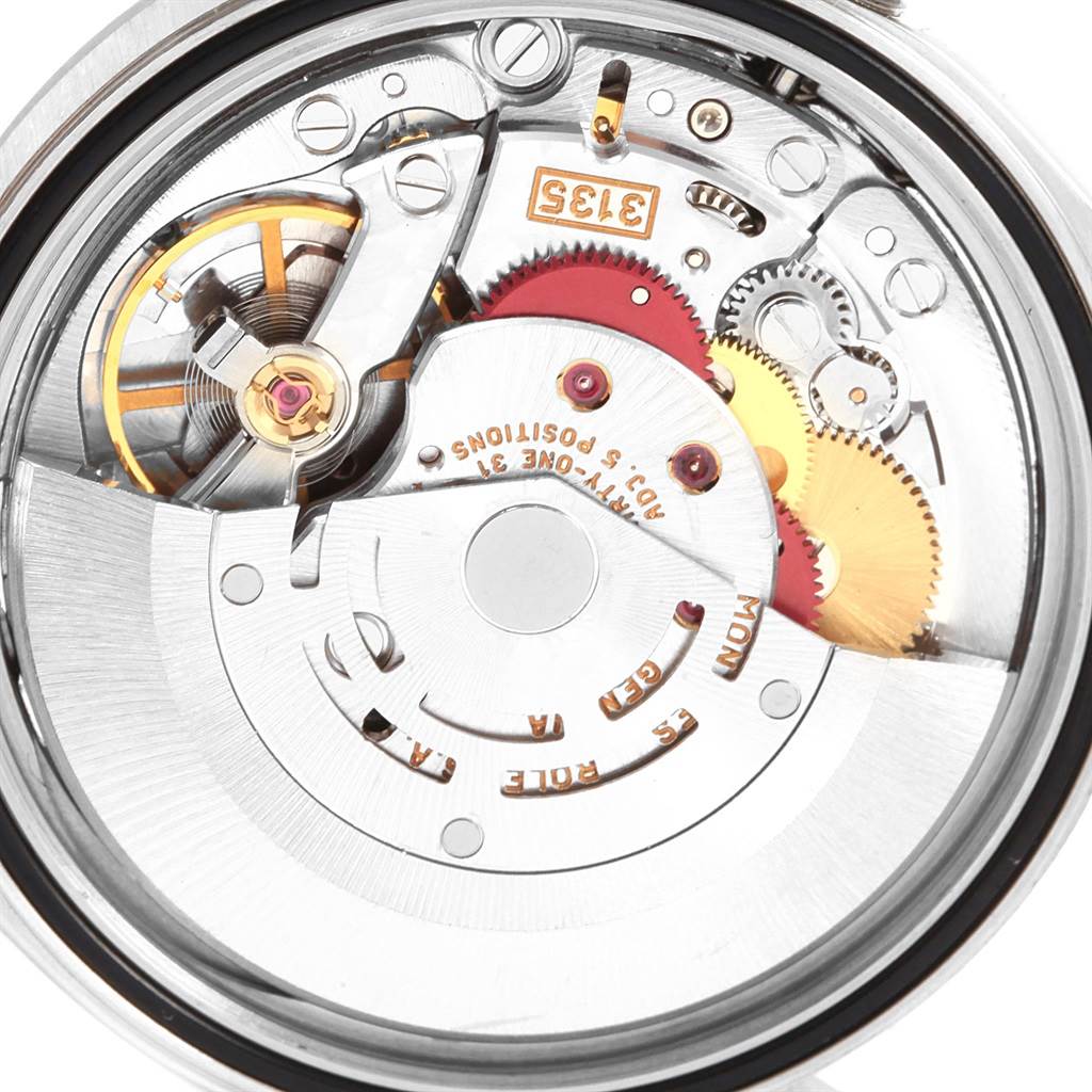 The image shows a close-up view of the movement parts of a Rolex Datejust 16234 Men
s Stainless Steel Silver Dial 16234 Men
s Stainless Steel Silver Dial watch.