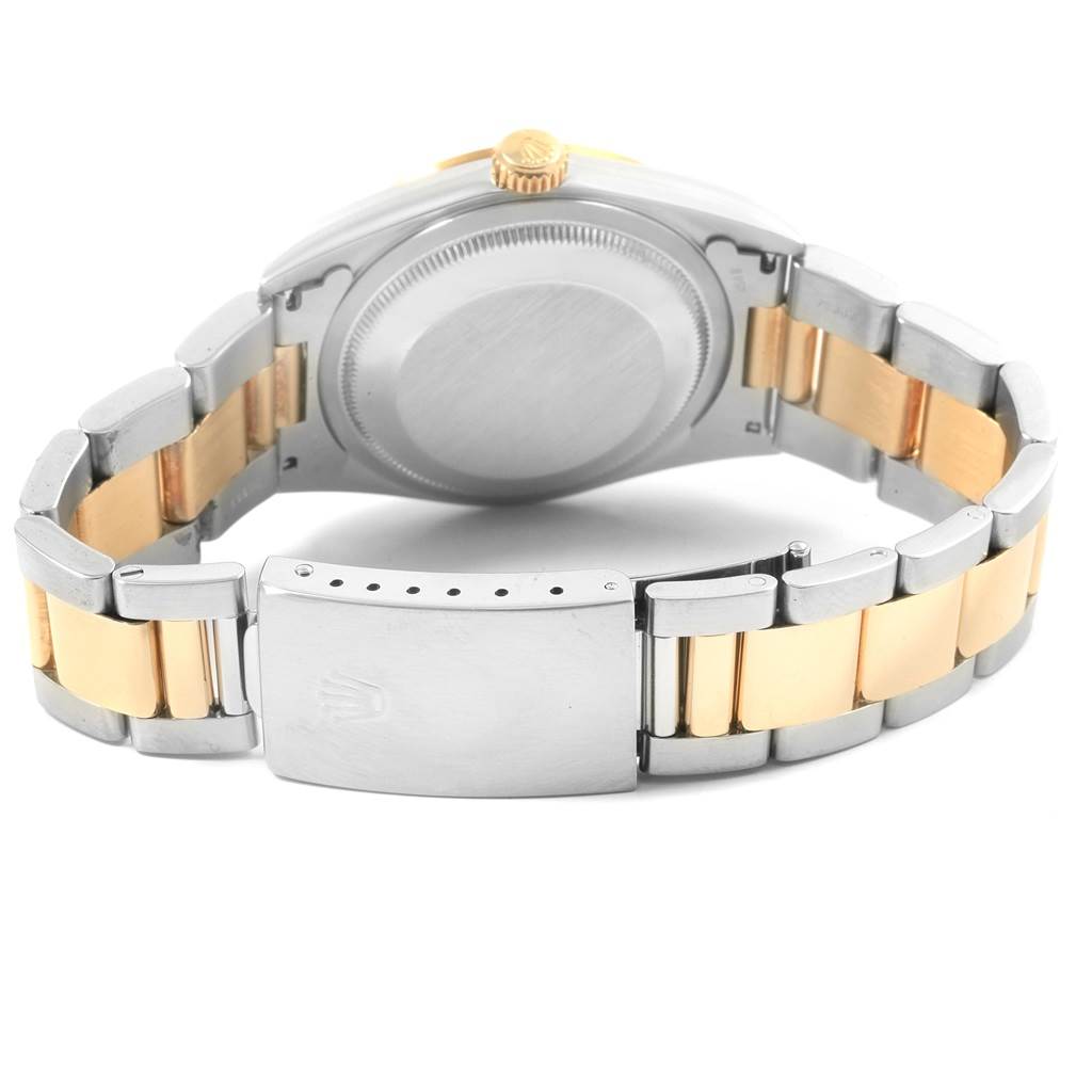 This image shows the back and clasp of the two-tone bracelet on a Rolex Datejust 16203 Men's Steel and Gold (two tone) Blue Dial 16203 Men's Steel and Gold (two tone) Blue Dial watch.