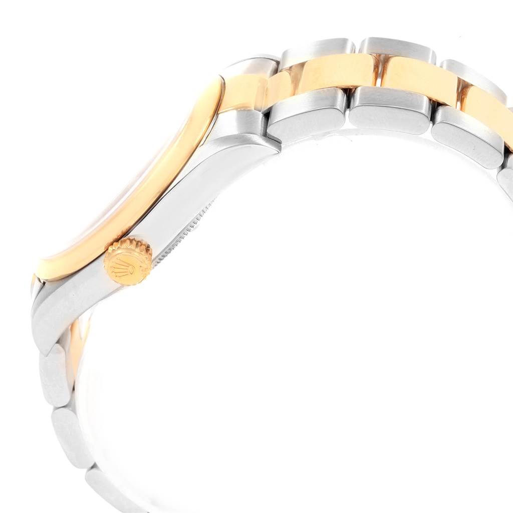 The image shows a side view of a Rolex Datejust 16203 Men's Steel and Gold (two tone) Blue Dial 16203 Men's Steel and Gold (two tone) Blue Dial watch, highlighting the crown, case, and part of the bracelet.