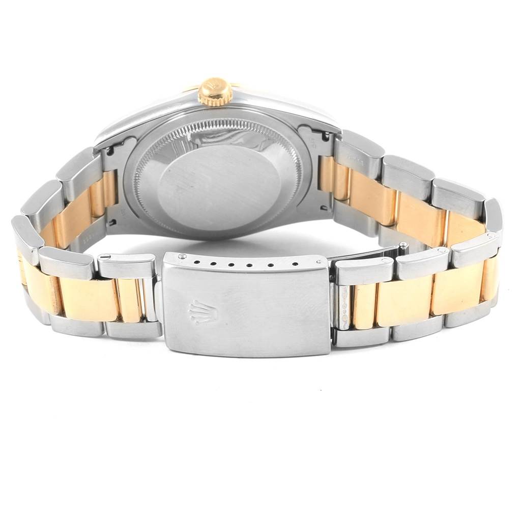 This image shows the back and bracelet of a Rolex Datejust 16203 Men's Steel and Gold (two tone) Black Dial 16203 Men's Steel and Gold (two tone) Black Dial watch, focusing on the clasp, case back, and two-tone bracelet.