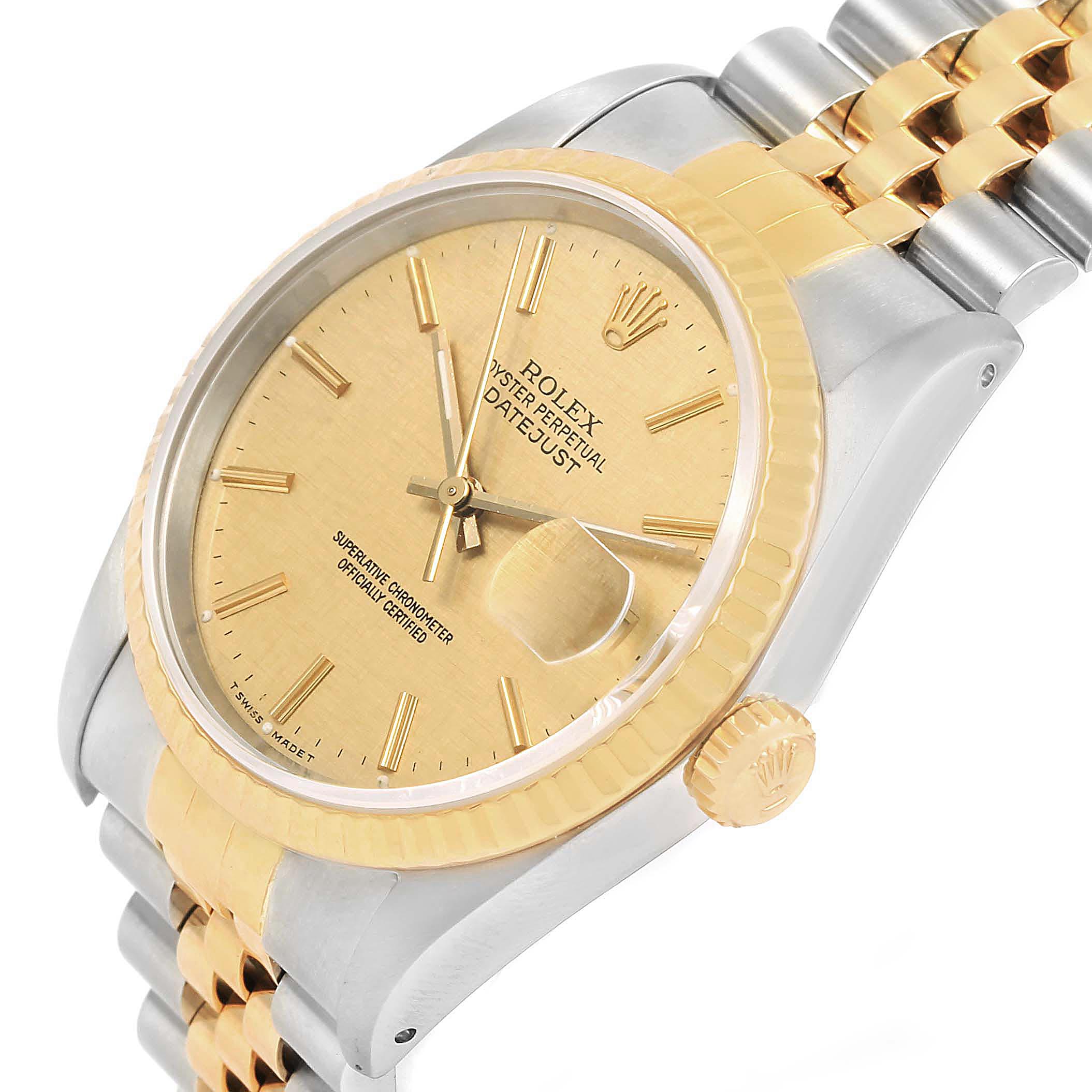 This image shows a Rolex Datejust 16233 Men's Steel and Gold (two tone) Champagne Dial 16233 Men's Steel and Gold (two tone) Champagne Dial watch at an angled view, highlighting the face, fluted bezel, crown, and part of the bracelet.