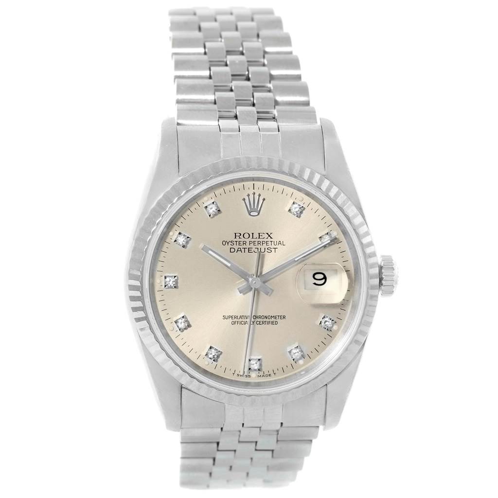 The Rolex Datejust 16234 Men
s Stainless Steel Silver Dial 16234 Men
s Stainless Steel Silver Dial watch is shown from a top-down angle, highlighting its dial, bezel, date window, and bracelet.
